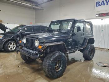  Salvage Jeep Wrangler